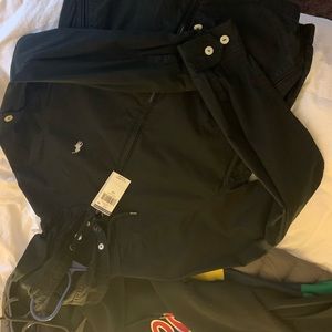Brand new black polo jacket.